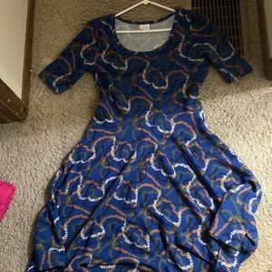 New without tags. Lularoe Nicole dress. Never worn.